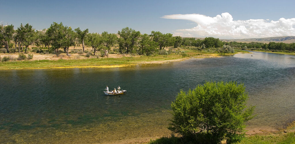 Drift boat on a Montana river in summer