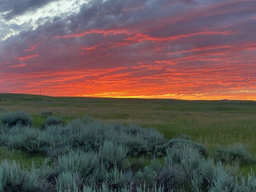 Sunset on the hilltop over the valley