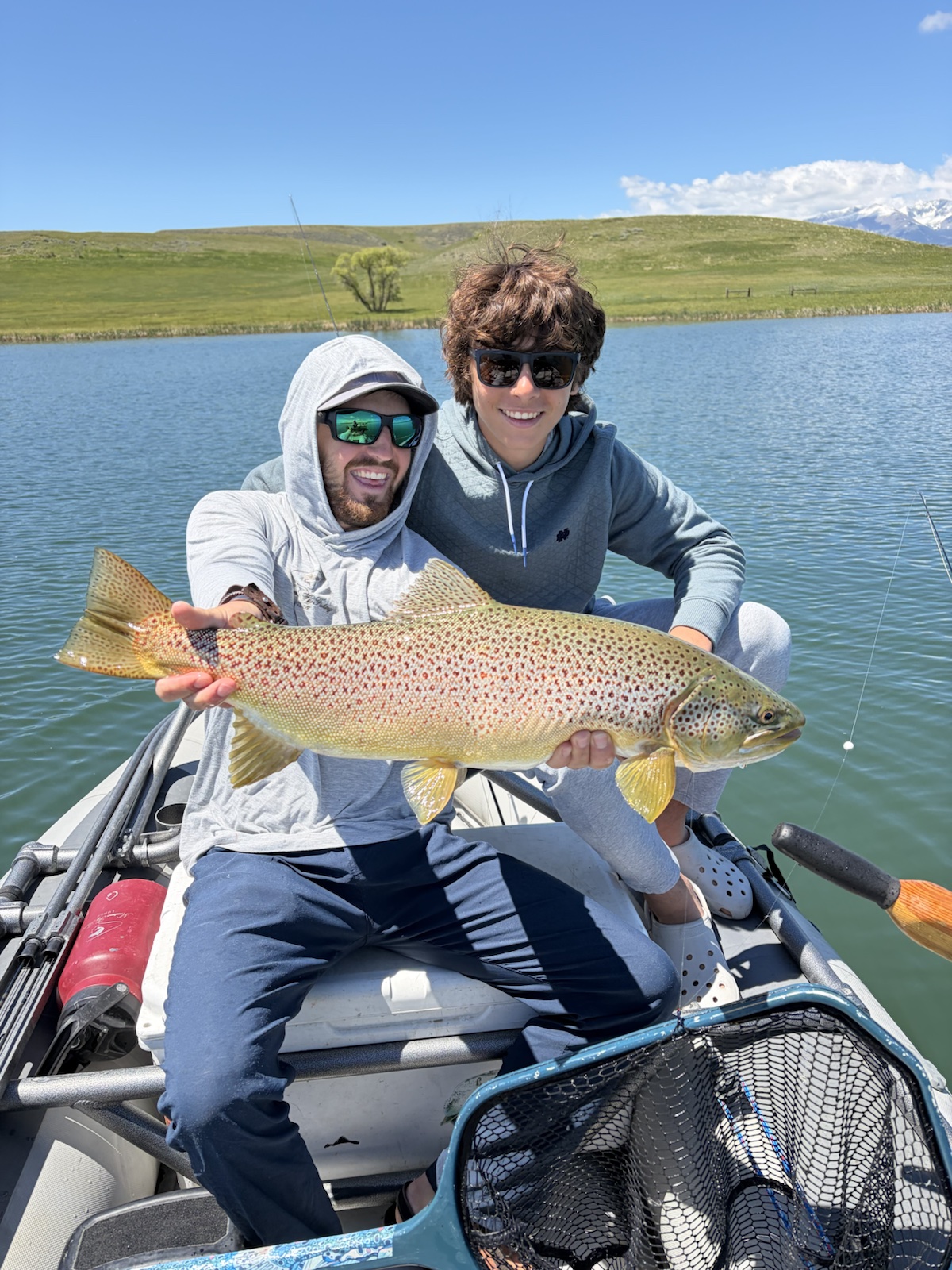 Guide Alex Hepworth with a guest and a trophy trout